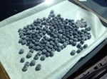 frozen blueberries on cookie sheet in car